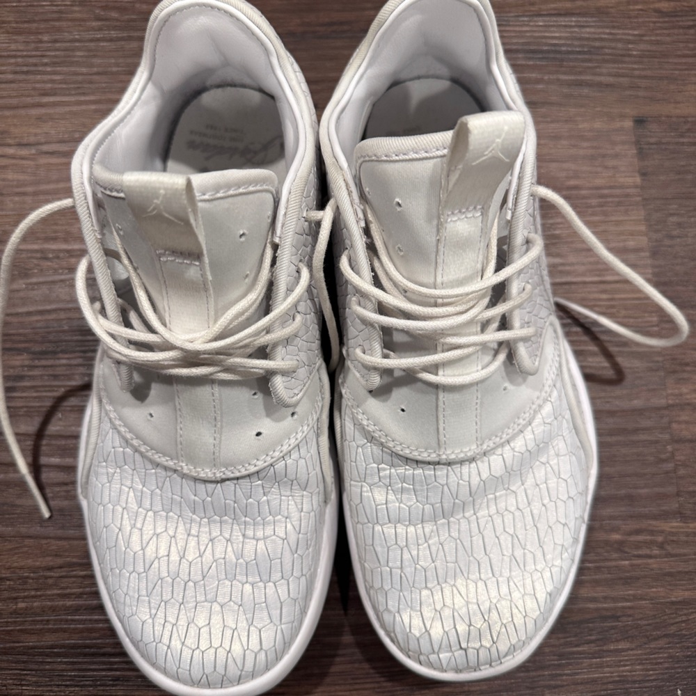 Air Jordan white shoes.